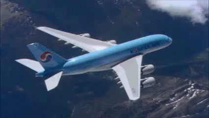 avion azul nubes montana