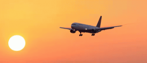 avion puesta de sol